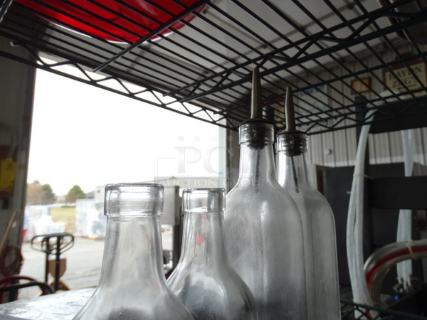 4 Glass Bottles. 2.5x2.5x8, 2.5x2.5x12. 4 Times Your Bid! - Image 2 of 3