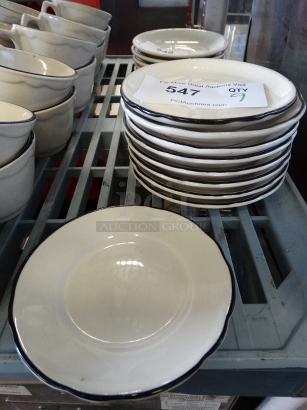 9 White Ceramic Items; 1 Plate and 8 Saucers. 5.5x5.5x1. 9 Times Your Bid!