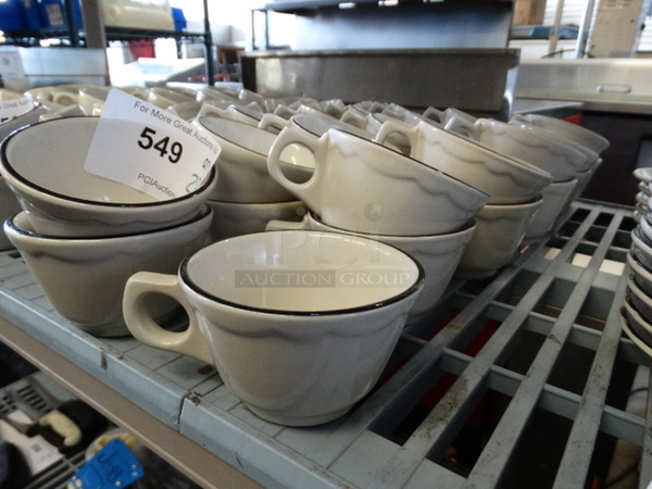 28 White Ceramic Mugs w/ Black Line on Rim. 5x4x2.5. 28 Times Your Bid! - Image 2 of 3