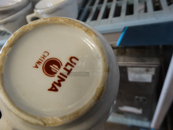 28 White Ceramic Mugs w/ Black Line on Rim. 5x4x2.5. 28 Times Your Bid! - Image 3 of 3