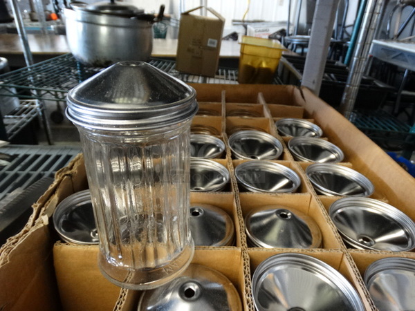 23 Sugar Shakers w/ 17 Lids. 3x3x6. 23 Times Your Bid! - Image 1 of 3