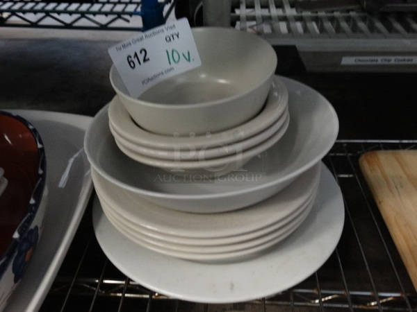 10 White Ceramic Dishes. Includes 8.5x8.5x2. 10 Times Your Bid!
