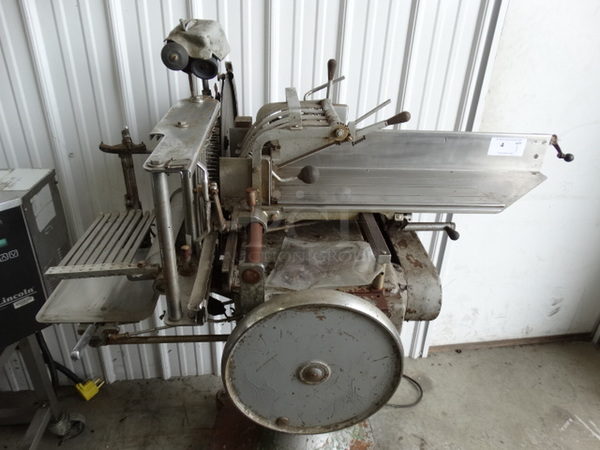 AMAZING! ANTIQUE! Berkel Model 170-D Stainless Steel Commercial Meat Slicer Stacker w/ Blade Sharpener on Original Stand! 56x36x59. Tested and Powers On But Parts Do Not Move - Image 6 of 10