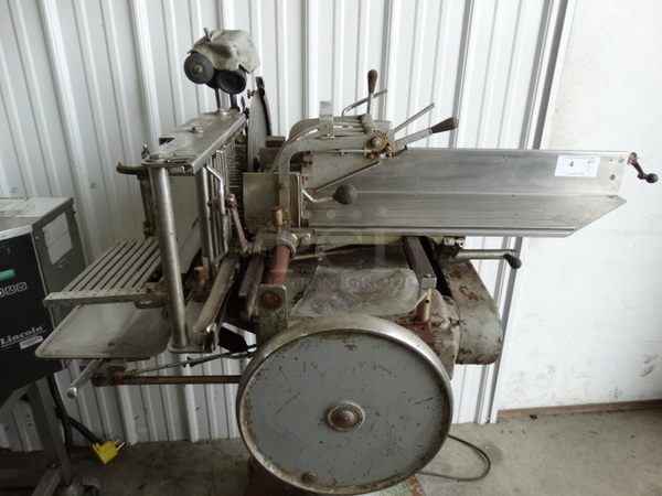 AMAZING! ANTIQUE! Berkel Model 170-D Stainless Steel Commercial Meat Slicer Stacker w/ Blade Sharpener on Original Stand! 56x36x59. Tested and Powers On But Parts Do Not Move - Image 7 of 10