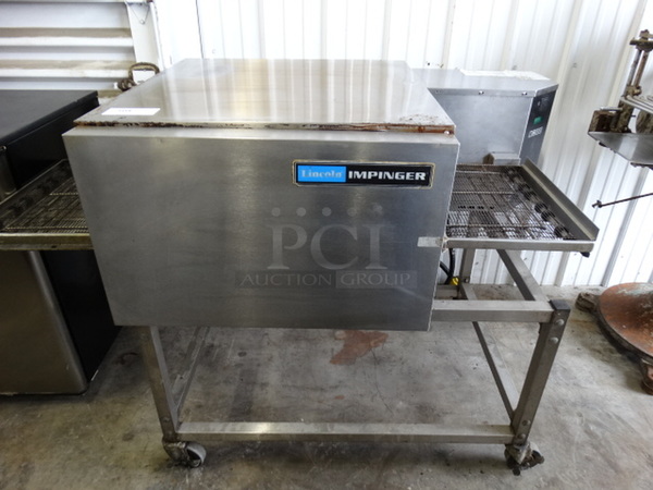 BEAUTIFUL! Lincoln Impinger Model 1132-000-A Stainless Steel Commercial Electric Powered Conveyor Pizza Oven on Commercial Casters. 208 Volts, 3 Phase. 61x37x43 - Image 1 of 9