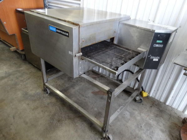 BEAUTIFUL! Lincoln Impinger Model 1132-000-A Stainless Steel Commercial Electric Powered Conveyor Pizza Oven on Commercial Casters. 208 Volts, 3 Phase. 61x37x43 - Image 2 of 9
