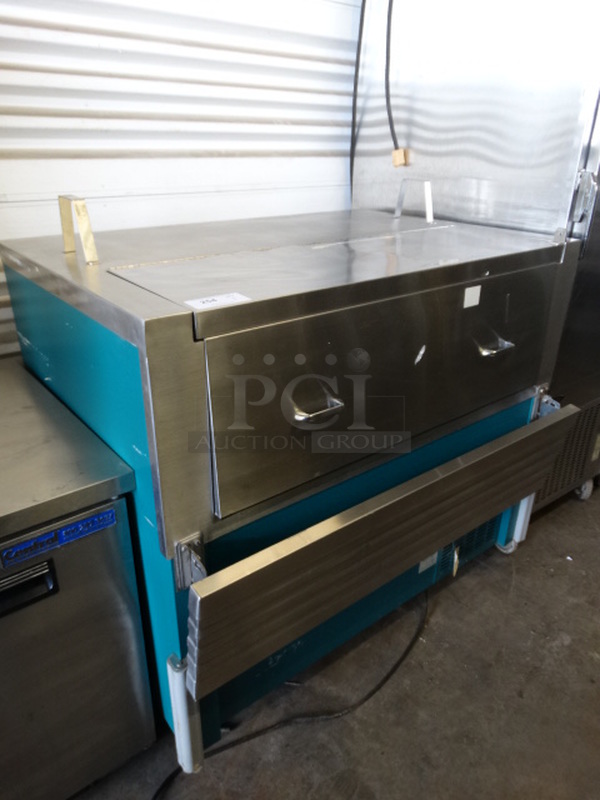 NICE! Servolift Eastern Model PDFRS-1313-12 Stainless Steel Commercial Milk Cooler w/ Tray Slide on Commercial Casters. 50x38x51. Tested and Powers On But Does Not Get Cold - Image 2 of 7