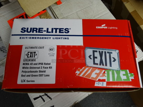 4 BRAND NEW! Cases of Cooper Lighting Model UXUKWH Ultimate Exit Signs. 6 Units Per Case. 14x8x2. 4 Times Your Bid! (Room 2)