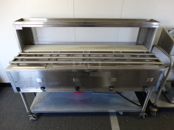 AMAZING! Eagle Model SPHT4-120 Stainless Steel Commercial Electric Powered 4 Bay Steam Table w/ Sneeze Guard, Tray Slide and Undershelf on Commercial Casters. 120 Volts, 1 Phase. 65x27x48. (Hallway)