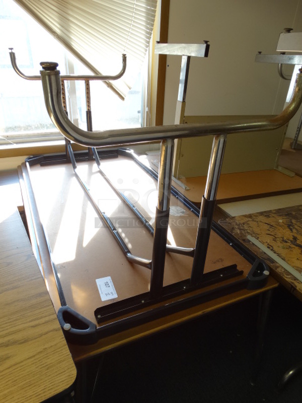 2 Tables on Metal Legs. Includes 60x29x27. 2 Times Your Bid! (Room 13)
