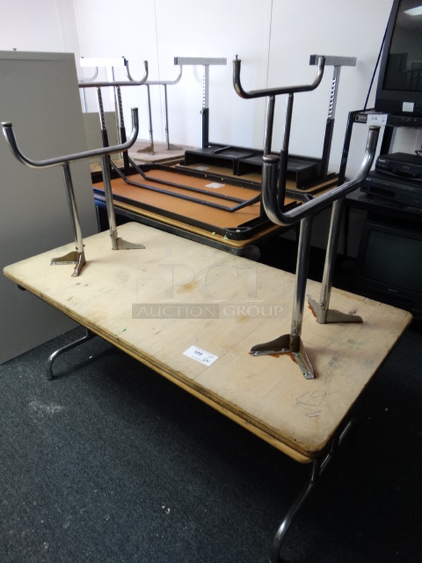 2 Tables on Metal Legs. Includes 60x30x26. 2 Times Your Bid! (Room 13)