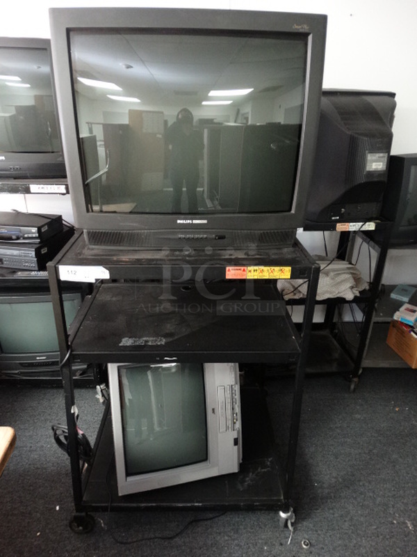 ALL ONE MONEY! Lot of Philips Television and JVC Television on Black Metal AV Cart on Commercial Casters! (Room 13)