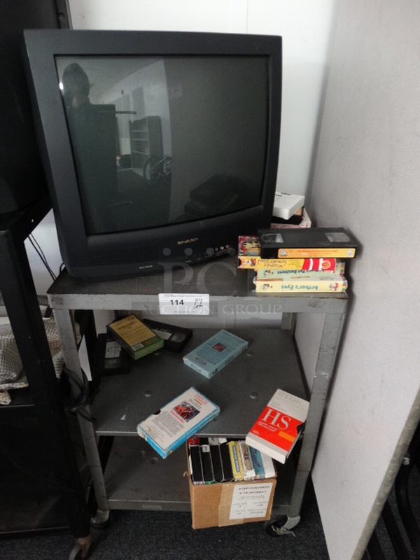 ALL ONE MONEY! Lot of Sharp Television and Various VHS Tapes on Gray Metal AV Cart on Commercial Casters! (Room 13)