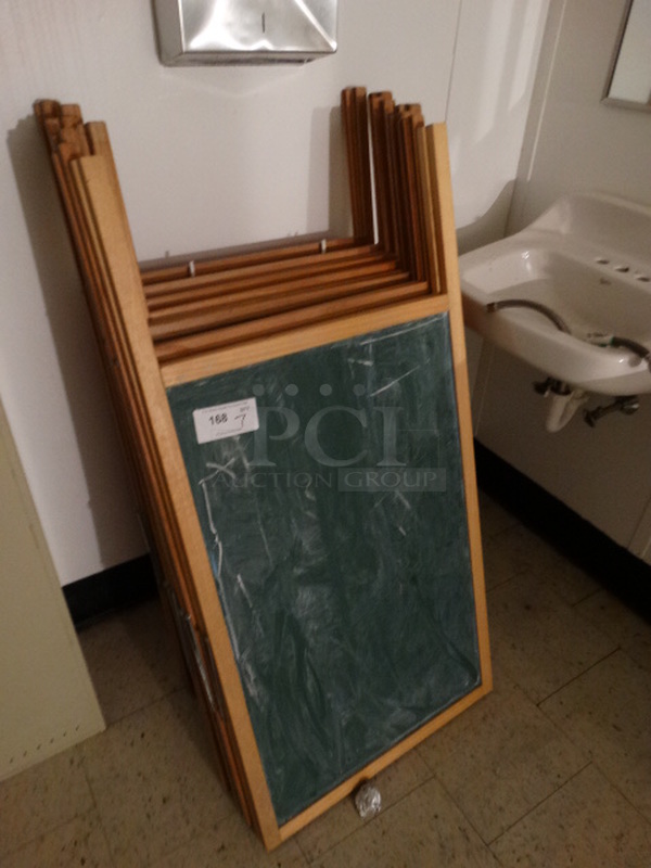7 Standing Chalkboards. 24x2x47. 7 Times Your Bid! (Men's Bathroom)