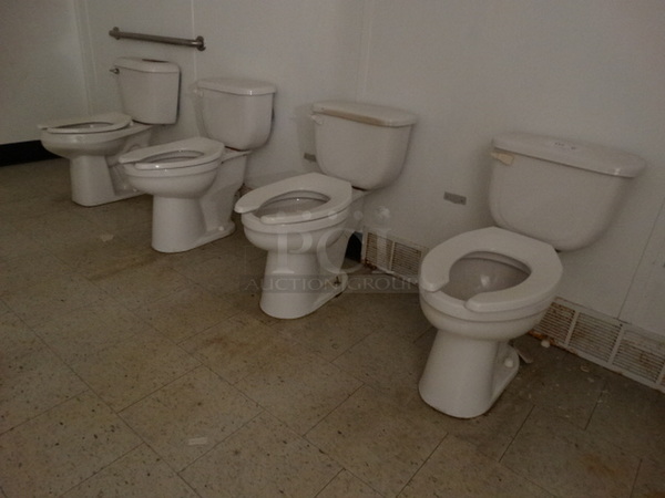 5 White Toilets. BUYER MUST REMOVE. 18x30x31. 5 Times Your Bid! (Women's Bathroom)