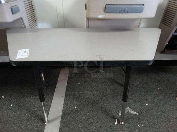 Gray Table on Metal Legs. 47x21x23. (Hallway) 