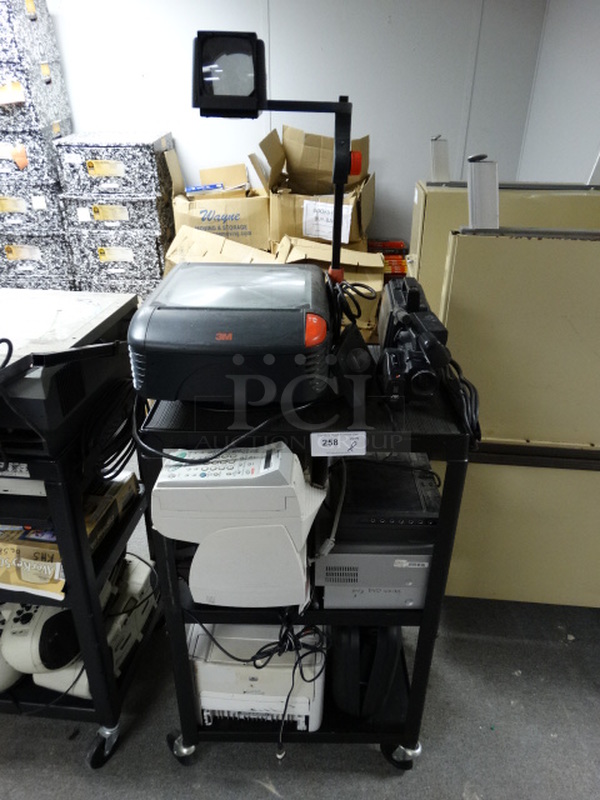 ALL ONE MONEY! Lot of Projector, 3 Printers and Black Metal Cart on Commercial Casters. 25x18x42. (Office/Room 10)