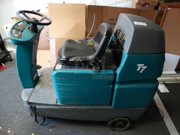 GREAT! Tennant T7 Commercial Riding Floor Cleaning Machine. 28x59x50. (Utility Room)