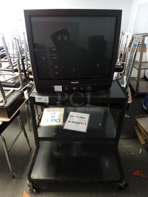 ALL ONE MONEY! Lot of Philips Television and Black Metal AV Cart on Commercial Casters! Cart 38x29x44. (Room 16)