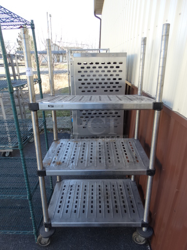 Chrome Finish 3 Tier Shelving Unit on Commercials. 36x24x69. BUYER MUST DISMANTLE. PCI CANNOT  DISMANTLE FOR SHIPPING. PLEASE CONSIDER FREIGHT CHARGES.