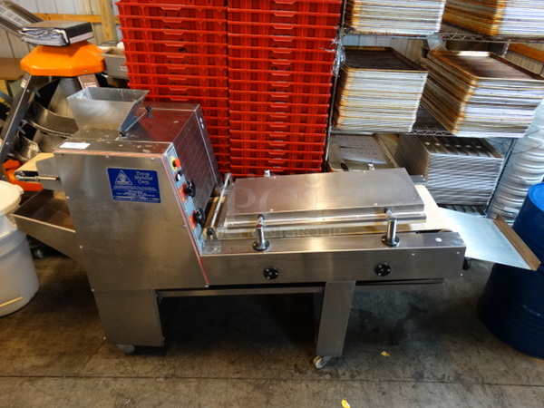 BEAUTIFUL! Kumkaya Model LM3100 Stainless Steel Commercial Floor Style Dough Long Moulding Sheeter Machine on Commercial Casters. This Unit Was Purchased Brand New In 2016. 208 Volts, 3 Phase. 28x101x54. Item Was In Working Condition On Last Day of Business!