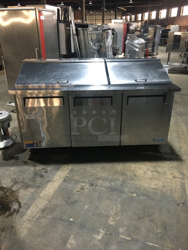 Turbo Air Commercial Refrigerated Sandwich Prep Table! With 3 Door Underneath Storage Space! With Poly Coated Racks! All Stainless Steel! Model MST7230 Serial MM7T802071! 115V! On Commercial Casters!