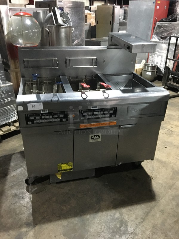 Frymaster Commercial Natural Gas Powered Dual Bay Deep Fat Fryer! With Right Side Dumping Station! With Heating Lamp Underneath! With 4 Metal Frying Baskets! With Backsplash & Oil Filter System! All Stainless Steel! Model FMGL230CSC Serial 0905EN0002! On Commercial Casters!