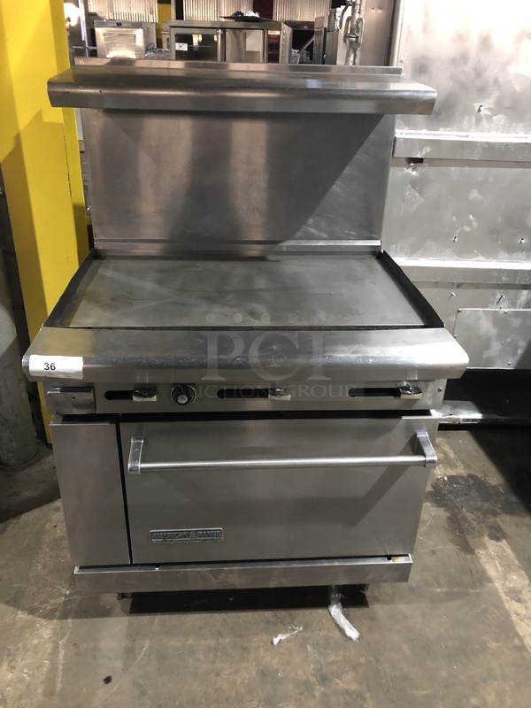 American Range Commercial Natural Gas Powered Flat Griddle/Plancha! With Raised Backsplash & Salamander Shelf! With Full Size Oven Underneath! All Stainless Steel! On Legs!