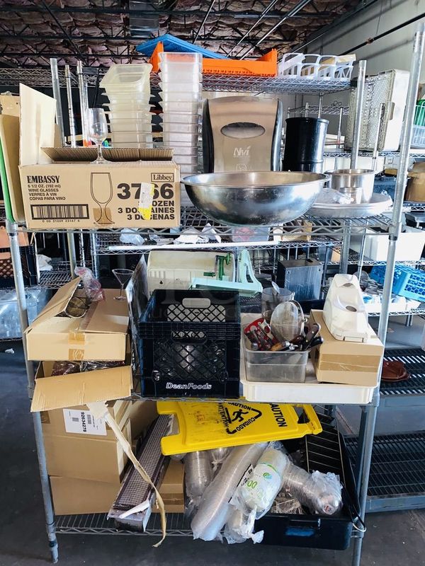 STACKED!! 3 Wide Shelves Loaded with New Libbey 6-1/2oz Wine Glasses, Hand-Free Paper Towel Dispenser, 7 New ULINE Foam Soap Dispenser, Cutlery, Caution Sign, ToGo Lids, Radiant Burner, Box of NEW NEVER USED Blue Sapphire Martini Glasses and More. NSF. Rack included. - Image 1 of 12