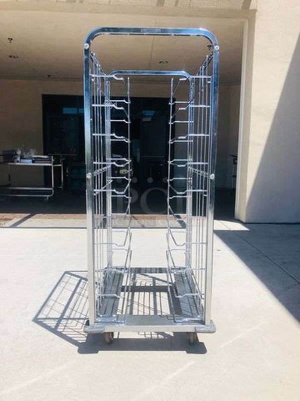 NICE!! Stainless Steel Tray Caddie on Commercial Casters. MULTI-FUNCTIONAL - Can be used for a variety functions.  23-3/4x33-1/2x63-1/2    **Trays pictured are not included, for demonstration purposes only** - Image 1 of 8