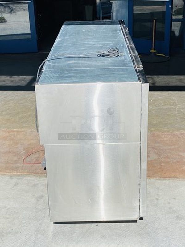 LIKE NEW! Krowne Back Bar. Model BS84L-KNB-LLR 115V, 60Hz, 1Ph, 9A. 35x84x24 Removed from the SLS. Used Briefly

35" high without top, 36" high 
24" front to back depth 
All stainless steel, coved corner interior with LED lighting Digital Thermostat Sideblow refrigeration 
High performance refrigeration system
Expansion valve with 134A refrigerant
Operating range of 30°F - 40°F (Preset at 35°F)
Heavy duty 18-gauge door jambs
NSF epoxy coated durable shelves. One bottom and two adjustable shelves per door.

*Due to EPA Regulations the Freon was removed.  - Image 6 of 9