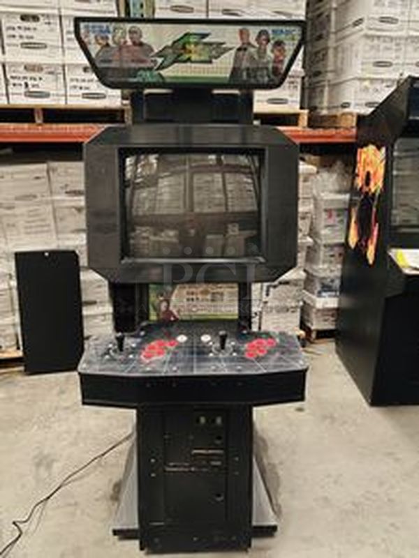 AWESOME! RARE! Sega Arcade Machine: The King of Fighting Xi. 120V 60Hz 2A 100Watts. In PERFECT WORKING ORDER. Option to set Game Play for Free or the Amount of Your Choice. Setup to accept Coins and/or Tokens.  MUST HAVE for any Man Cave.  Slight damage to the outside upper right corner on rear service door. Key to lock on is missing, so the lock has been disabled.