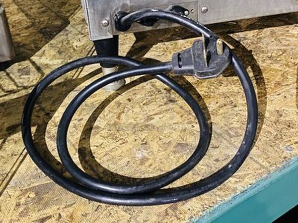 AMAZING! Quik N' Crispy GF5 Greaseless Fryer. Works Like New!   The patented Quik n’ Crispy® Model GF5 uses a combination of forced hot air, radiant heat, and an elevated perforated cooking basket to prepare ovenable frozen foods to the taste and texture as if they were deep-fat fried.   Dimensions: 23-1/2" W x 20" D x 13-1/2" H 208V (29 amp) / 60Hz/ 1 Phase Plug Type: NEMA #6-30R Weight: 175 lbs  Can Stack multiple to save space and increase productivity. Works Like New. - Image 6 of 10