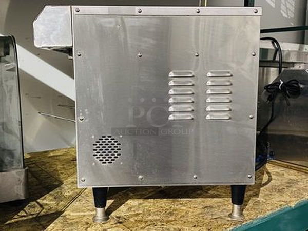 AMAZING! Quik N' Crispy GF5 Greaseless Fryer. Works Like New!   The patented Quik n’ Crispy® Model GF5 uses a combination of forced hot air, radiant heat, and an elevated perforated cooking basket to prepare ovenable frozen foods to the taste and texture as if they were deep-fat fried.   Dimensions: 23-1/2" W x 20" D x 13-1/2" H 208V (29 amp) / 60Hz/ 1 Phase Plug Type: NEMA #6-30R Weight: 175 lbs  Can Stack multiple to save space and increase productivity. Works Like New. - Image 8 of 10