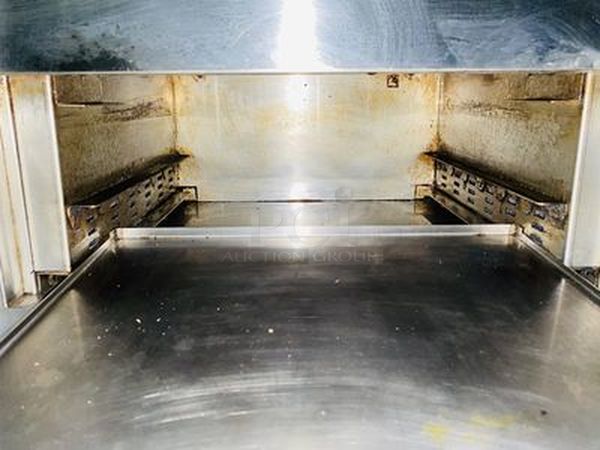 AMAZING! Quik N' Crispy GF5 Greaseless Fryer. Works Like New!   The patented Quik n’ Crispy® Model GF5 uses a combination of forced hot air, radiant heat, and an elevated perforated cooking basket to prepare ovenable frozen foods to the taste and texture as if they were deep-fat fried.   Dimensions: 23-1/2" W x 20" D x 13-1/2" H 208V (29 amp) / 60Hz/ 1 Phase Plug Type: NEMA #6-30R Weight: 175 lbs  Can Stack multiple to save space and increase productivity. Works Like New. - Image 9 of 10