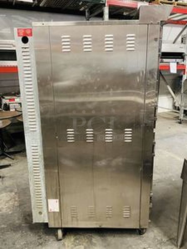 LIKE NEW, Barley Used!! Doyon Baking Equipment JA12SLG 38" Jet Air Gas Dual Convection Oven Model: 12 Full (18"x26")Pans, side loading, reversing fan system, digital temperature controller and timer, steam injection system, full view glass doors, interior light, stainless steel interior & exterior, casters.  Removed From Ceasar's Hotel and Casino  38"W x 72¾"H x 37½"D  120/208 volts 60Hz 3Ph 7A Phases 3 Watts 60 - Image 3 of 9