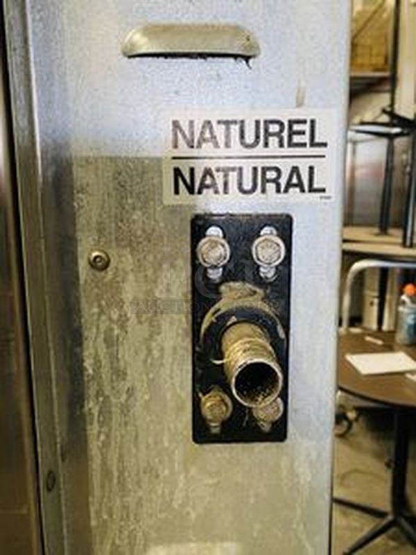 LIKE NEW, Barley Used!! Doyon Baking Equipment JA12SLG 38" Jet Air Gas Dual Convection Oven Model: 12 Full (18"x26")Pans, side loading, reversing fan system, digital temperature controller and timer, steam injection system, full view glass doors, interior light, stainless steel interior & exterior, casters.  Removed From Ceasar's Hotel and Casino  38"W x 72¾"H x 37½"D  120/208 volts 60Hz 3Ph 7A Phases 3 Watts 60 - Image 8 of 9