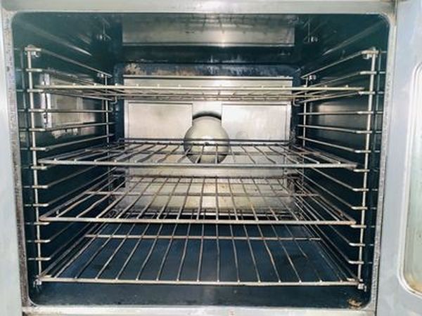 Great Condition! Garland MCO-GS-20S Master Series 200 Natural Gas Double Deck Standard Depth Full Size Convection Oven with Analog Controls - 120,000 BTU. On Commercial Casters.   The  MCO-GS-20S Oven has Master 200 solid state analog controls and a temperature range of 150-500 degrees Fahrenheit.  120V/1Ph.  Width 38 Inches  Depth 41 1/4 Inches Height 70 1/2 Inches Interior Width 29 Inches Interior Depth 24 Inches Interior Height 24 Inches 18 x 26 Pan Capacity 12 Pans Control Type Dial  Power Type Natural Gas - Image 8 of 10
