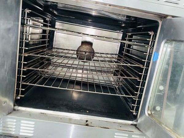 Great Condition! Garland MCO-GS-20S Master Series 200 Natural Gas Double Deck Standard Depth Full Size Convection Oven with Analog Controls - 120,000 BTU. On Commercial Casters.   The  MCO-GS-20S Oven has Master 200 solid state analog controls and a temperature range of 150-500 degrees Fahrenheit.  120V/1Ph.  Width 38 Inches  Depth 41 1/4 Inches Height 70 1/2 Inches Interior Width 29 Inches Interior Depth 24 Inches Interior Height 24 Inches 18 x 26 Pan Capacity 12 Pans Control Type Dial  Power Type Natural Gas - Image 9 of 10