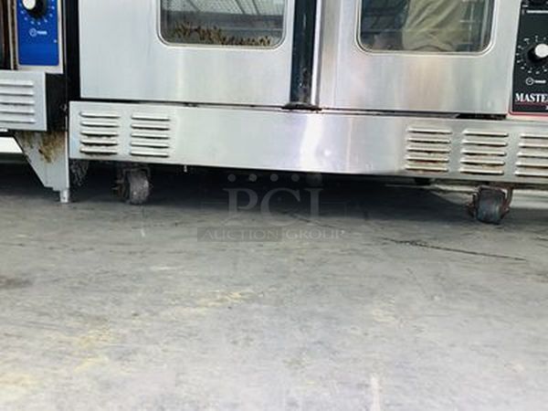 Great Condition! Garland MCO-GS-20S Master Series 200 Natural Gas Double Deck Standard Depth Full Size Convection Oven with Analog Controls - 120,000 BTU. On Commercial Casters.   The  MCO-GS-20S Oven has Master 200 solid state analog controls and a temperature range of 150-500 degrees Fahrenheit.  120V/1Ph.  Width 38 Inches  Depth 41 1/4 Inches Height 70 1/2 Inches Interior Width 29 Inches Interior Depth 24 Inches Interior Height 24 Inches 18 x 26 Pan Capacity 12 Pans Control Type Dial  Power Type Natural Gas - Image 10 of 10