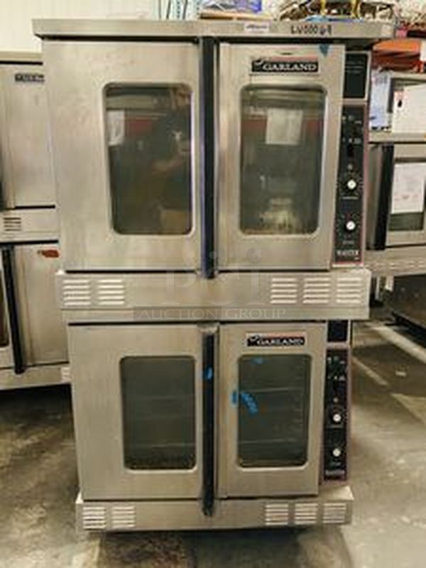 Great Condition! Garland MCO-GS-20S Master Series 200 Natural Gas Double Deck Standard Depth Full Size Convection Oven with Analog Controls - 120,000 BTU. On Commercial Casters.   The  MCO-GS-20S Oven has Master 200 solid state analog controls and a temperature range of 150-500 degrees Fahrenheit.  120V/1Ph.  Width 38 Inches  Depth 41 1/4 Inches Height 70 1/2 Inches Interior Width 29 Inches Interior Depth 24 Inches Interior Height 24 Inches 18 x 26 Pan Capacity 12 Pans Control Type Dial  Power Type Natural Gas