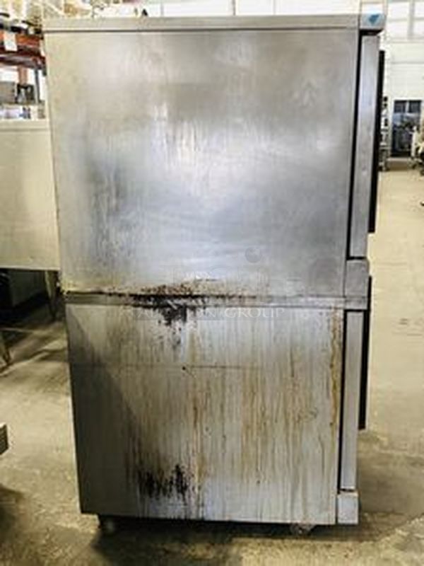Great Condition! Garland MCO-GS-20S Master Series 200 Natural Gas Double Deck Standard Depth Full Size Convection Oven with Analog Controls - 120,000 BTU. On Commercial Casters.   The  MCO-GS-20S Oven has Master 200 solid state analog controls and a temperature range of 150-500 degrees Fahrenheit.  120V/1Ph.  Width 38 Inches  Depth 41 1/4 Inches Height 70 1/2 Inches Interior Width 29 Inches Interior Depth 24 Inches Interior Height 24 Inches 18 x 26 Pan Capacity 12 Pans Control Type Dial  Power Type Natural Gas - Image 2 of 10