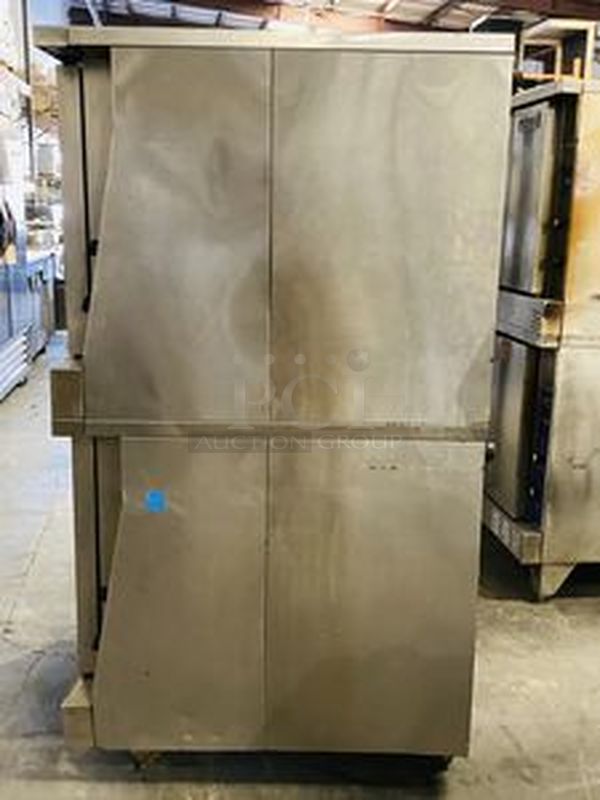 Great Condition! Garland MCO-GS-20S Master Series 200 Natural Gas Double Deck Standard Depth Full Size Convection Oven with Analog Controls - 120,000 BTU. On Commercial Casters.   The  MCO-GS-20S Oven has Master 200 solid state analog controls and a temperature range of 150-500 degrees Fahrenheit.  120V/1Ph.  Width 38 Inches  Depth 41 1/4 Inches Height 70 1/2 Inches Interior Width 29 Inches Interior Depth 24 Inches Interior Height 24 Inches 18 x 26 Pan Capacity 12 Pans Control Type Dial  Power Type Natural Gas - Image 3 of 10