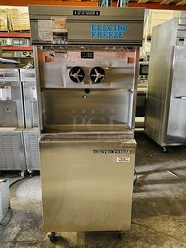 SUPER CLEAN! LIGHTLY USED!! Electro Freeze 88F-CMT-213 2 Flavor Twist Pressure Fed Ice Cream Machine. Air Cooled. 230V 1Ph 60Hz. Removed From CJs Custard. Must Be Hard Wired. 26x36-1/2x68Dispenser Heads were lost in transit. 