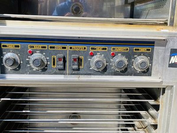 NICE! NU-VU SUB-123 Commercial Proofer Oven Combo 208v 3Ph Double Decker Bread Baking Center On Commercial Casters. Lighted Interior; Holds (3) Racks for Oven & (9) Racks for Proofer; (10) RACKS INCLUDED; 3″ HEAVY DUTY LOCK-ABLE CASTERS. 208V, Phase 1+N, 30Amps, 60Hz**HARD WIRE ELECTRICAL  INSTALL REQUIRED. Working When Removed. 
 77″H x 36-1/8″W x 28½”D - Image 5 of 9