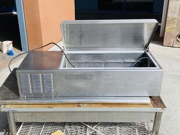 SWEET! SKPS8 Silver King Refrigerated Countertop Prep Unit - TESTED, TURNS ON! Quickly Gets Down to and HOLDS TEMP  The SKPS8 Refrigerated Countertop Prep Unit, has a self-contained refrigeration system, holds (8) 1/6 size pans (no pans included), stainless steel interior and exterior, removable & reversible stainless steel cover, adjustable temperature control, on/off switch, 1/8 HP, ETL Safety, ETL Sanitation. +33°F to +41°F. 43" x 16-1/2"x10". 7' cord. 1⁄8 HP.  115v 60Hz 1.7A  Cord Needs to be replaced. - Image 1 of 6