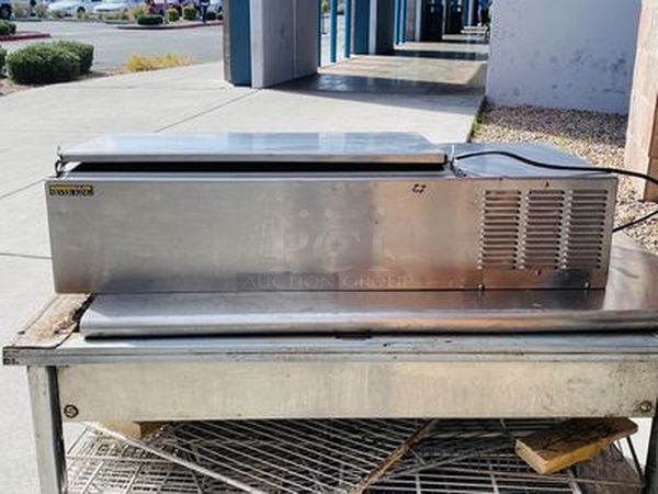 SWEET! SKPS8 Silver King Refrigerated Countertop Prep Unit - TESTED, TURNS ON! Quickly Gets Down to and HOLDS TEMP  The SKPS8 Refrigerated Countertop Prep Unit, has a self-contained refrigeration system, holds (8) 1/6 size pans (no pans included), stainless steel interior and exterior, removable & reversible stainless steel cover, adjustable temperature control, on/off switch, 1/8 HP, ETL Safety, ETL Sanitation. +33°F to +41°F. 43" x 16-1/2"x10". 7' cord. 1⁄8 HP.  115v 60Hz 1.7A  Cord Needs to be replaced. - Image 4 of 6