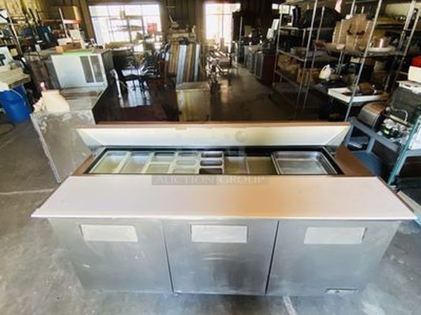 SWEET! True Model: TSSU-72-18. 72" Sandwich/Salad Prep Table w/ Refrigerated Base. On Commercial Casters. 115V 60Hz 1PH 10.5Amps.  72x30x43  Tested. Turns on. Blows Cool Air - Image 2 of 10