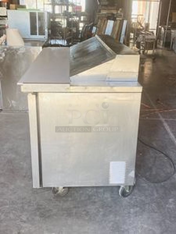 SWEET! True Model: TSSU-72-18. 72" Sandwich/Salad Prep Table w/ Refrigerated Base. On Commercial Casters. 115V 60Hz 1PH 10.5Amps.  72x30x43  Tested. Turns on. Blows Cool Air - Image 8 of 10