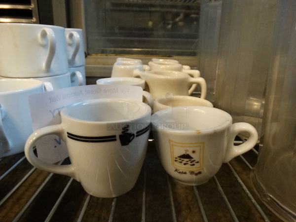 10 Various Ceramic Mugs / Pitchers. Includes 3.5x2.5x2.5. 10 Times Your Bid!